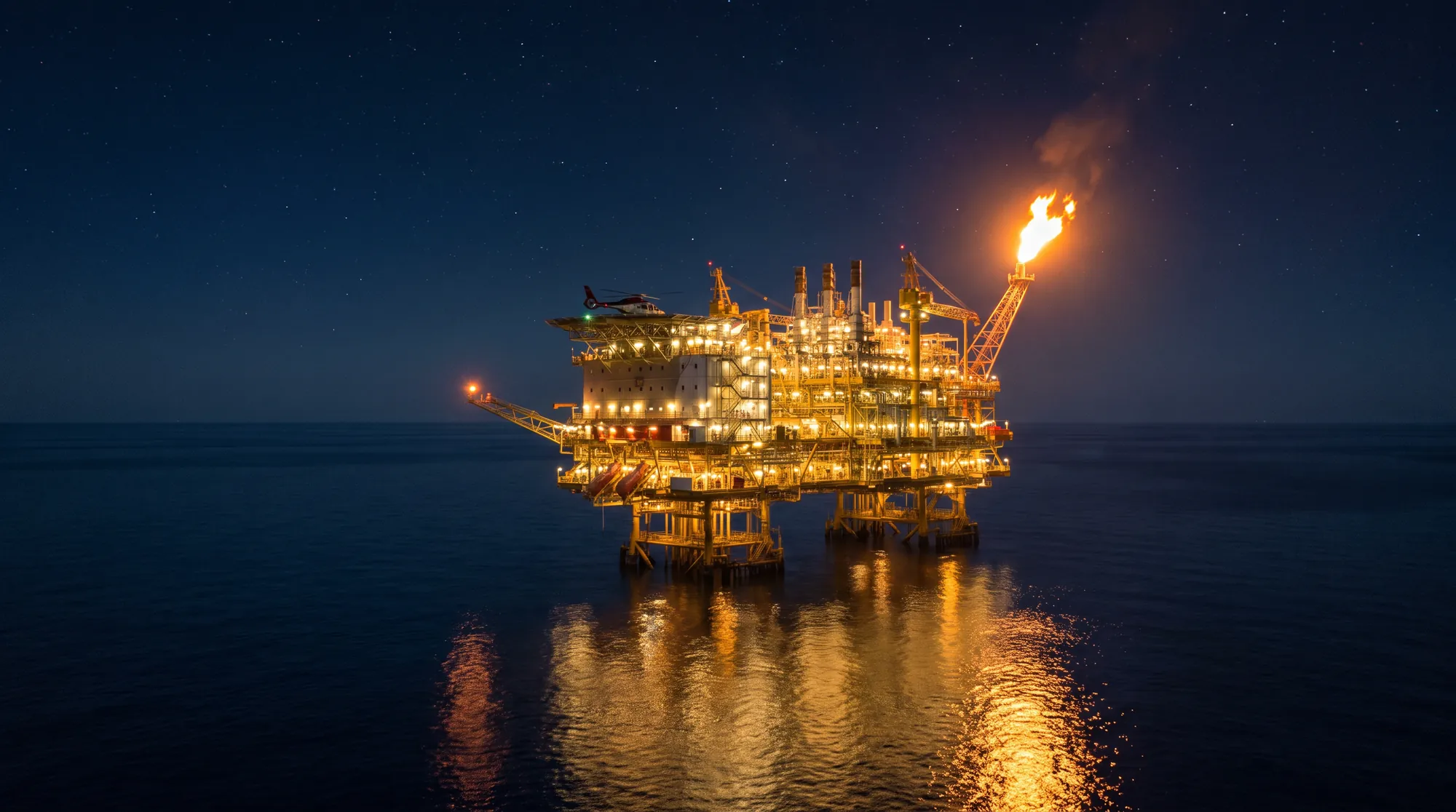 Offshore gas platform at night